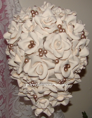 Cascade Bouquet of Medium "D" Regular and Reality Roses in assorted sizes 